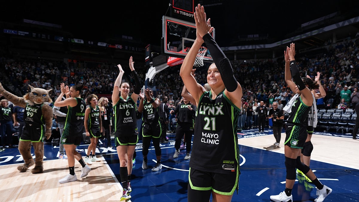 The Minnesota Lynx celebrate after the game against the Connecticut Sun during Round 2 Game 5 of the 2024 WNBA Playoffs on October 8, 2024 at Target Center in Minneapolis, Minnesota. - null