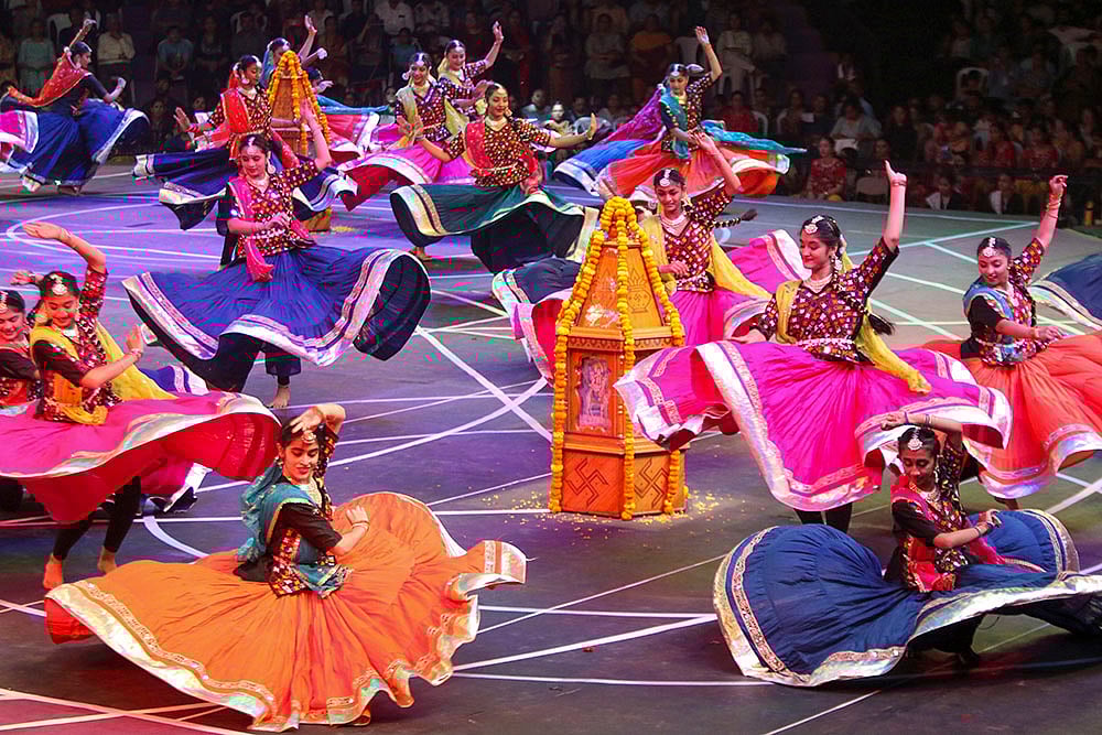 | Photo: PTI : Women perform garba in Rajkot