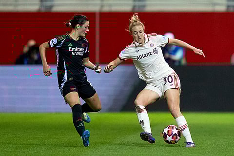 Women's Champions League: Munich's Carolin Simon, right, and Arsenal's Emily Fox, left, challenge for the ball