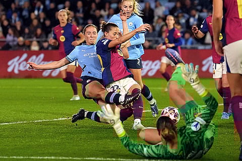 Women's Champions League: Manchester City's Naomi Layzell, left, scores the opening goal