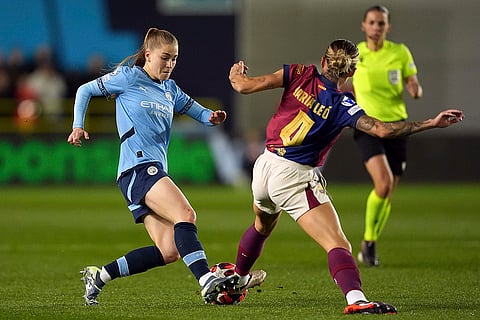 Women's Champions League: Manchester City's Jess Park, left, and Barcelona's Maria Leon, right, challenge for the ball