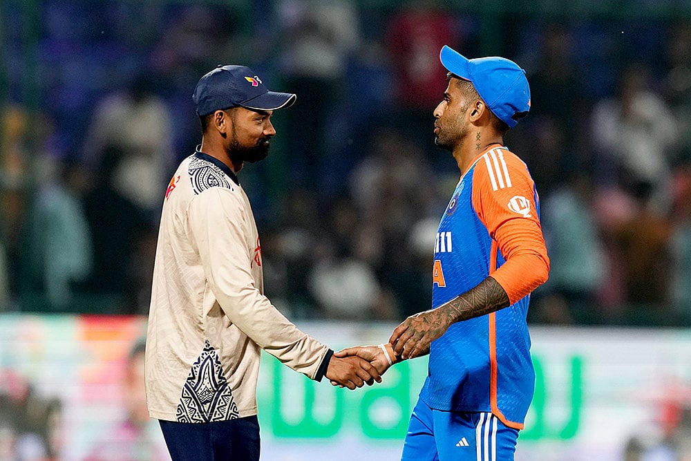 | Photo: PTI/Manvender Vashist Lav : India vs Bangladesh: Suryakumar Yadav being congratulated by Najmul Hossain Shanto