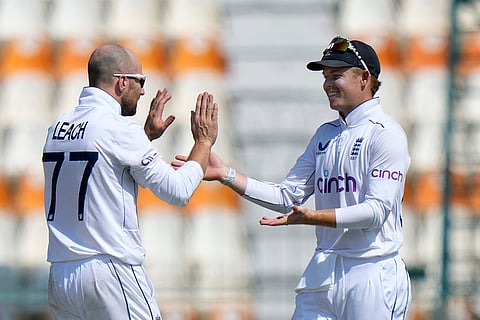 Pakistan vs England 1st Test: Jack Leach celebrates with Ollie Pope after taking the wicket of Pakistan's Shaheen Shah Afridi