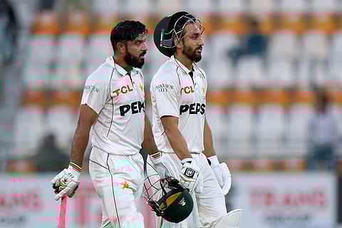 Pakistan vs England: Pakistan's Aamer Jamal, left, and Salman Ali Agha walk off the field on the end of fourth day
