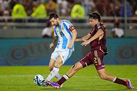 FIFA World Cup 2026 Qualifiers: Argentina's Lionel Messi takes a shot challenged by Venezuela's Nahuel Ferraresi