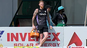 Photo: AP/Anjum Naveed : England's Ben Stokes watches from the sidelines.