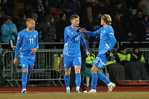 Iceland's Logi Tómasson, center, celebrates after scoring his side's first goal