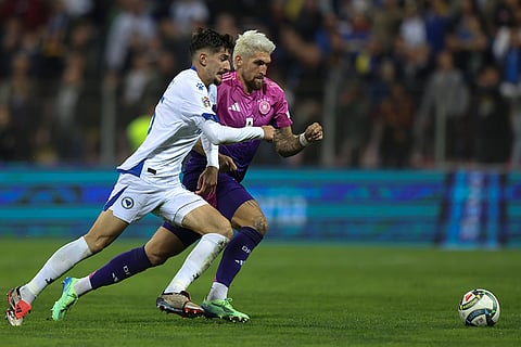 Nations League Soccer: Bosnia's Armin Gigovic, left and Germany's Robert Andrich fight for the ball