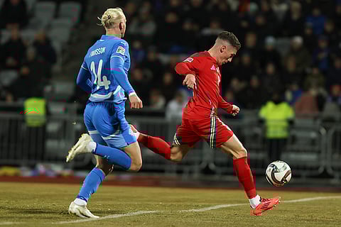 Nations League Soccer: Harry Wilson of Wales, right, races through to score his side's second goal