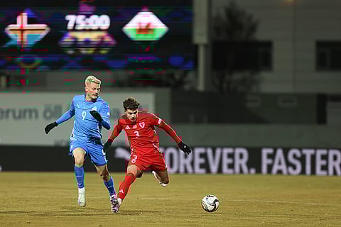 Nations League Soccer: Iceland's Orri Óskarsson, left, chases Neco Williams of Wales
