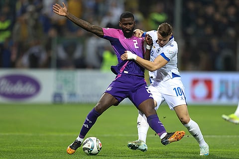 Nations League Soccer: Germany's Antonio Rudiger, left, and Bosnia's Ermedin Demirovic fight for the ball
