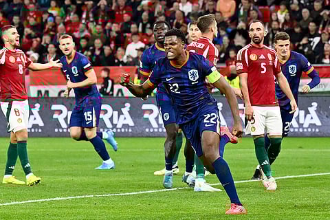 Nations League Soccer: Denzel Dumfries of the Netherlands celebrates after scoring his side's first goal