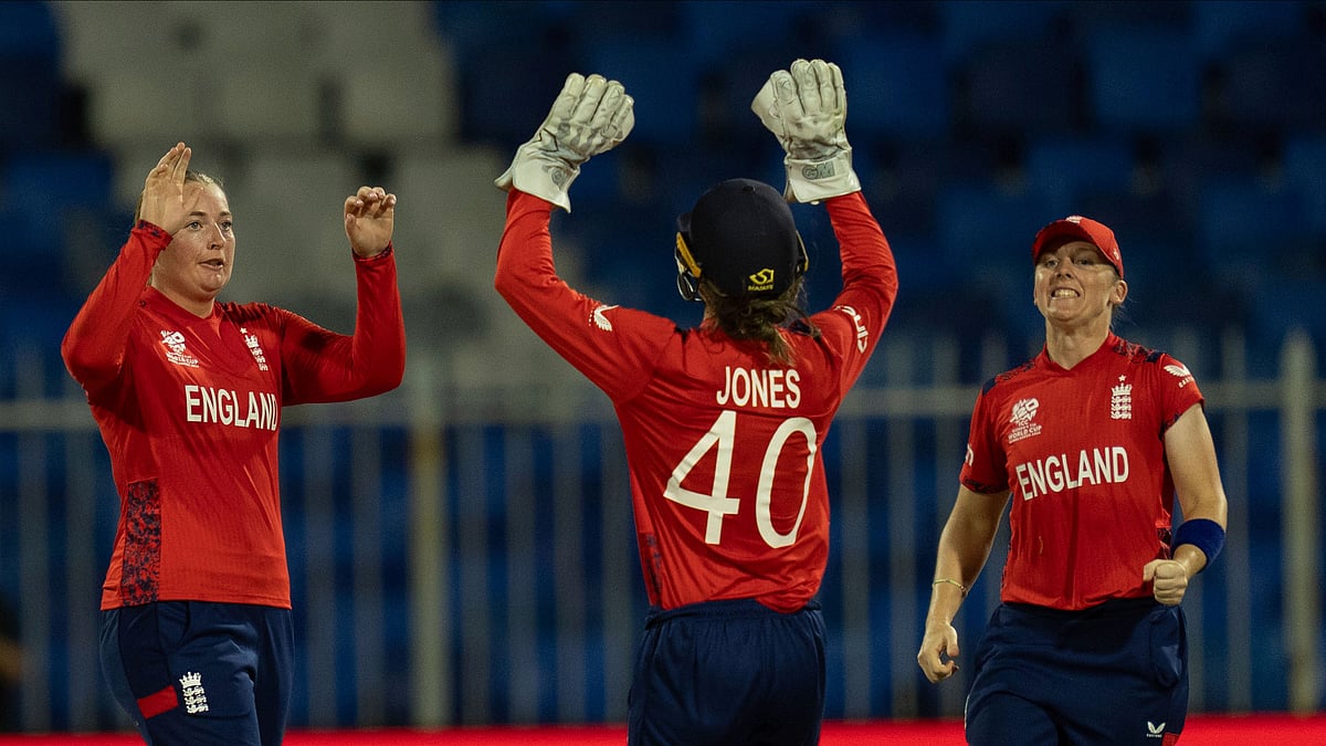 AP Photo/Altaf Qadri : Sophie Ecclestone, left, celebrates the wicket of South Africa's captain Laura Wolvaardt during the ICC Women's T20 World Cup 2024 match between England and South Africa at Sharjah Stadium.