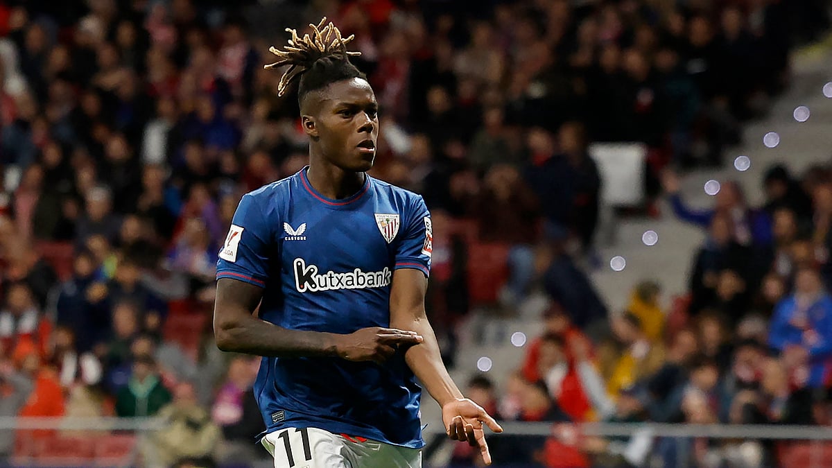 Nico Williams points to his skin after scoring at Atletico Madrid last season