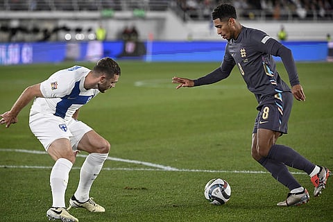 Nations League Soccer: Arttu Hoskonen of Finland, left, and Jude Bellingham of England challenge for the ball