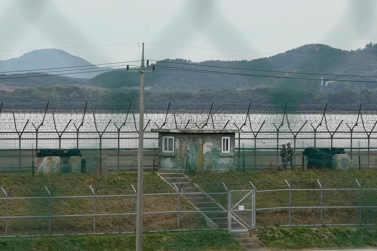 AP; Representational Image : South Korean army soldiers patrol along the barbed-wire fence in Paju, South Korea, near the border with North Korea, Monday, Oct. 14, 2024.