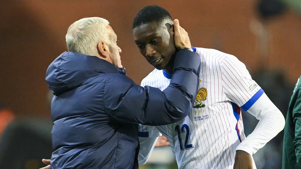 Randal Kolo Muani and Didier Deschamps