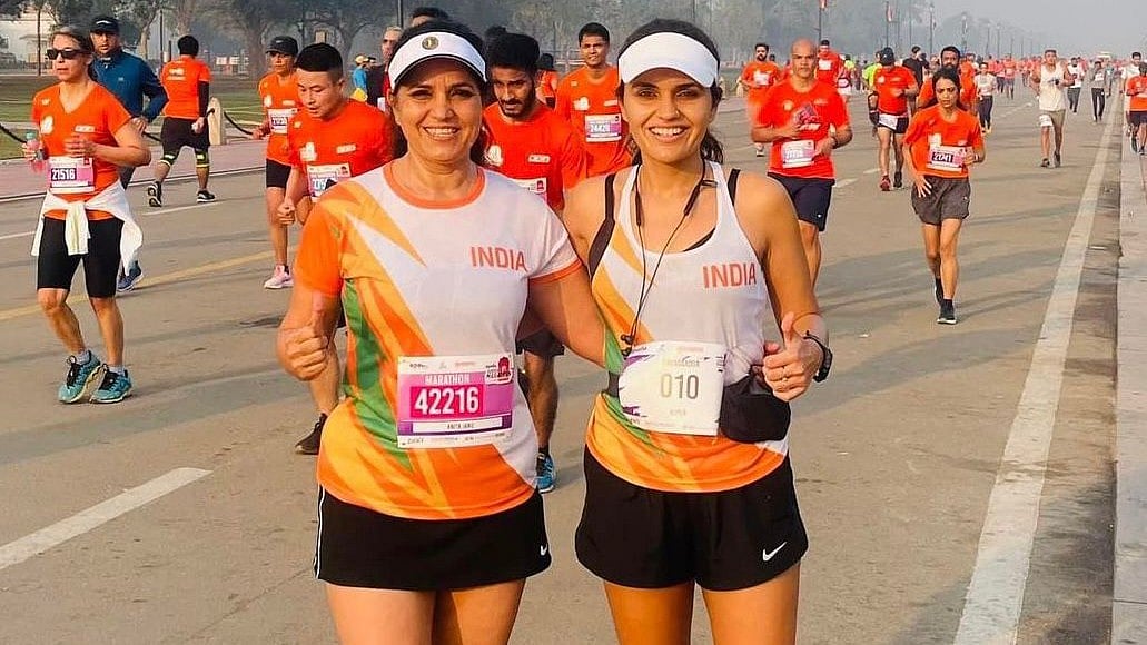 Special Arrangement : Anita Janu (left) with daughter Nupur after completing yet another marathon.
