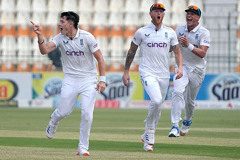 PAK Vs ENG 2nd Test: England's Matthew Potts, center, celebrates after taking wicket of Pakistan's Salman Ali Agha