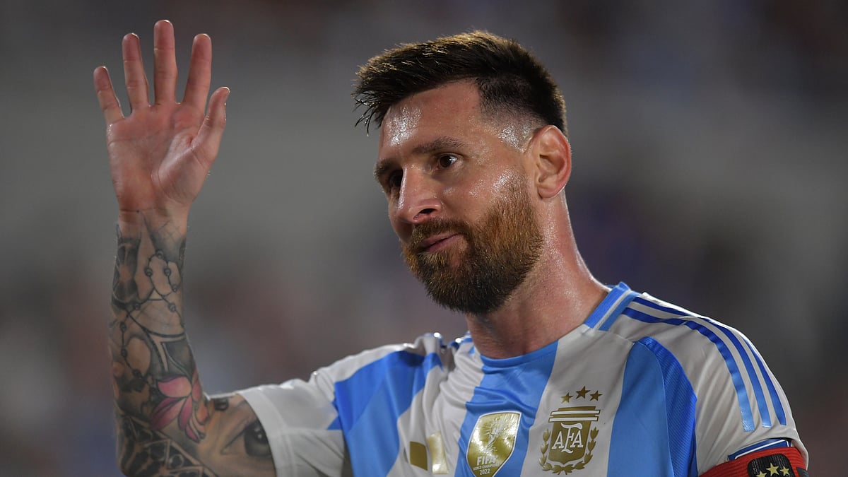 Lionel Messi waves to fans during Argentina's big win over Bolivia.