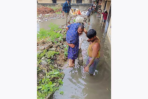 Tamil Nadu Rains: An elderly woman being evacuated in Chennai