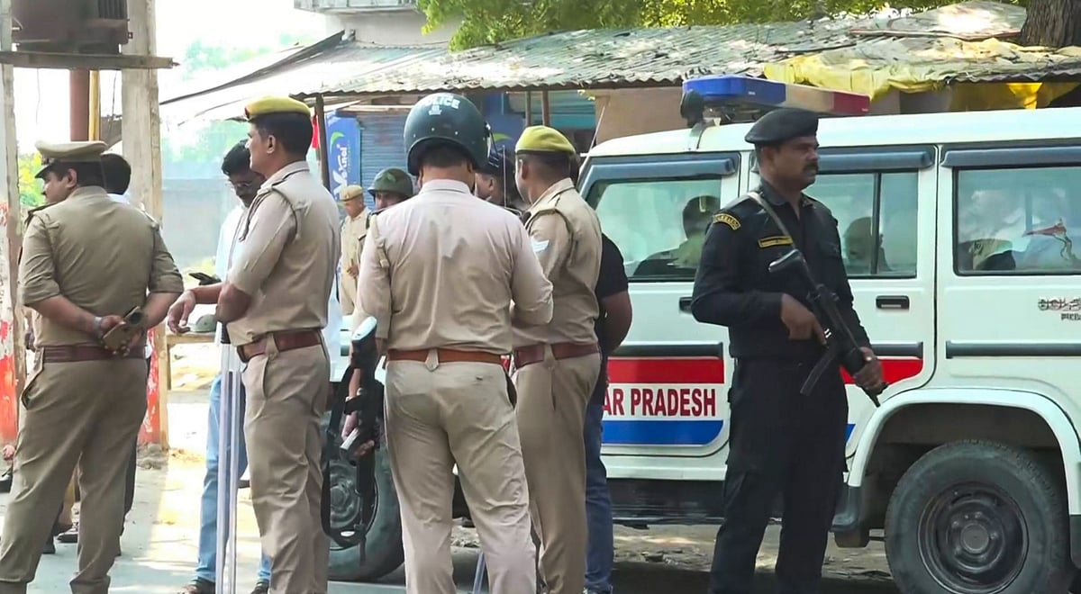 PTI : Security personnel deployed to maintain law & order in a violence-affected area in Bahraich | 