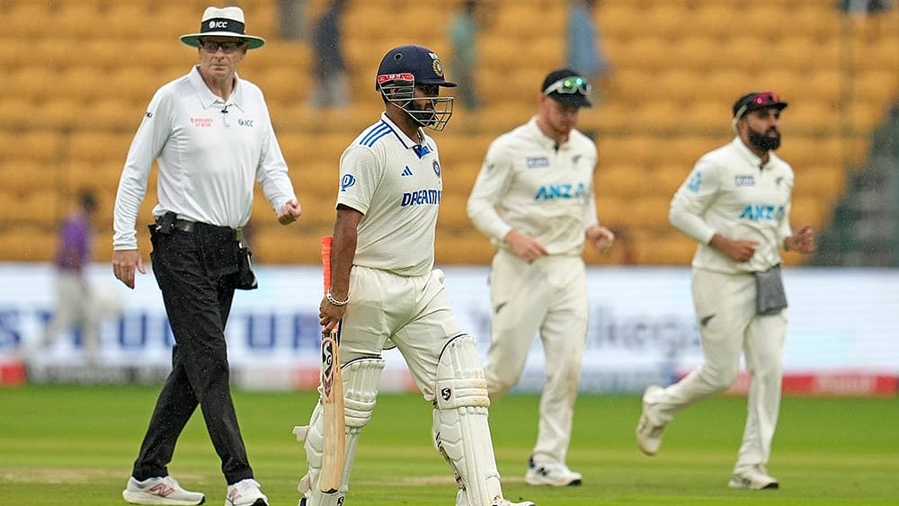IND Vs NZ 1st Test: India's Rishabh Pant, leaves the field after rain stopped play - | Photo: AP/Aijaz Rahi