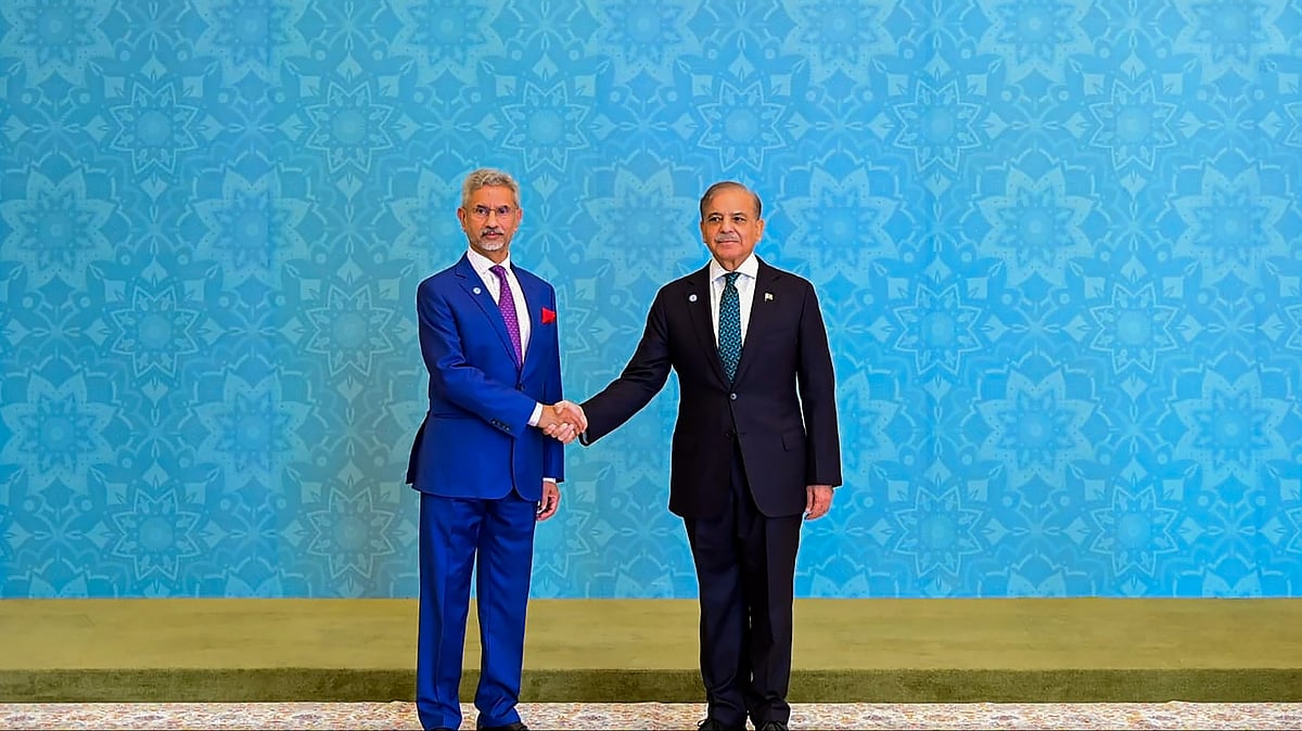 PTI Photo : External Affairs Minister S Jaishankar shakes hands with Pakistan Prime Minister Shehbaz Sharif at the 23rd meeting of the SCO Council of Heads of Government, in Islamabad.