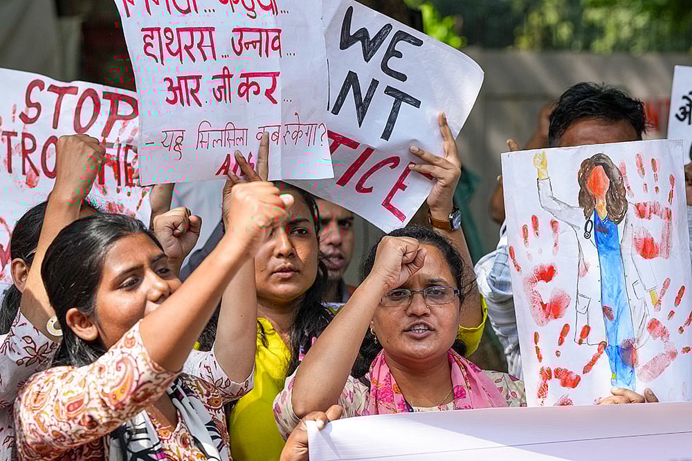 Photo: PTI/Atul Yadav : Protest against Kolkata rape-murder