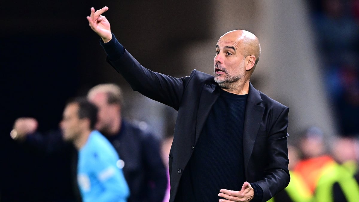 Pep Guardiola on the touchline