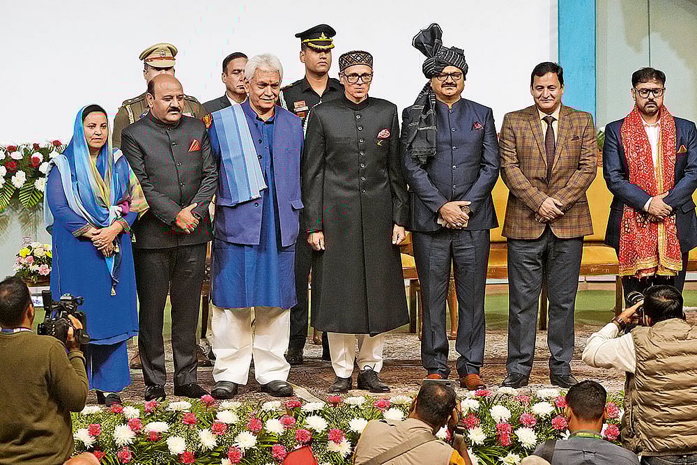 Omar Abdullah (fourth from left) at the swearing-in ceremony of the new J&K government in Srinagar