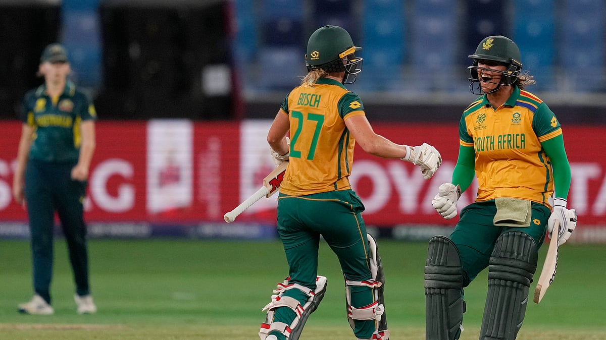 South Africa's Anneke Bosch and Chloé Tryon celebrate after winning against Australia during the ICC Women's T20 World Cup 2024 semi-final match at Dubai International Cricket Stadium. - AP Photo/Altaf Qadri