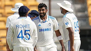 | Photo: AP/Aijaz Rahi : IND Vs NZ 1st Test: India's Jasprit Bumrah, celebrates after the dismissal of New Zealand's Tom Blundell