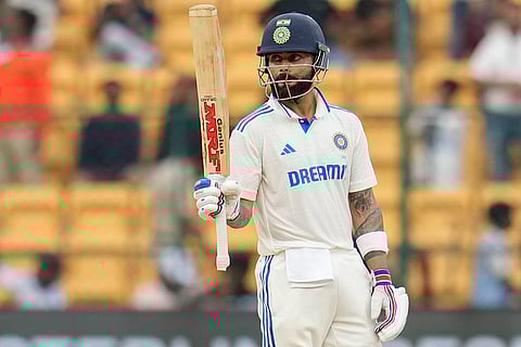 IND Vs NZ 1st Test: India's Virat Kohli celebrates after scoring fifty runs
