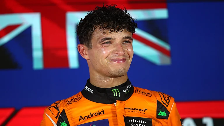 Lando Norris is 52 points behind Max Verstappen at the top of the drivers' standings. - null