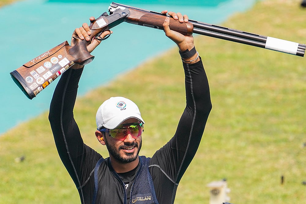| Photo: PTI/Kamal Kishore : ISSF World Cup: India's Anantjeet Singh Naruka celebrates bronze medal