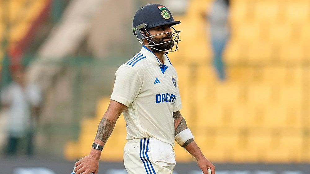 IND Vs NZ 1st Test: Virat Kohli walks off the field after losing his wicket - | Photo: AP/Aijaz Rahi