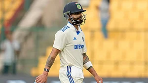 | Photo: AP/Aijaz Rahi : IND Vs NZ 1st Test: Virat Kohli walks off the field after losing his wicket