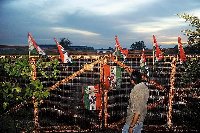 Protest Over Land: After the Supreme Court verdict, farmers in Singur celebrate in front of the abandoned Tata factory - Photo: Sandipan Chatterjee