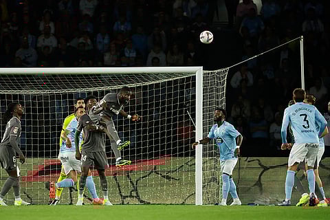 La liga 2024-25: Real Madrid's Antonio Rudiger, centre, heads the ball against Celta