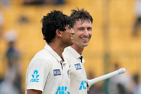 IND Vs NZ 1st Test: New Zealand's Will Young, right, and Rachin Ravindra walk off the field after their win