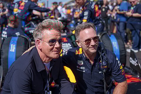 F1 US Grand Prix Auto Racing: Chef Gordon Ramsay, left, poses for a picture with Christian Horner