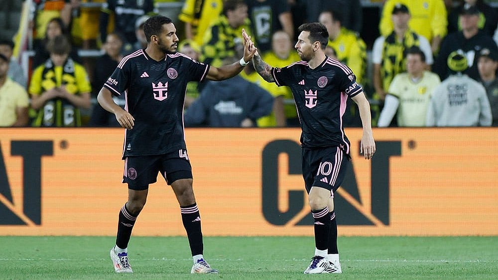 | Photo: AP/Jay LaPrete : MLS Supporters' Shield, Columbus Crew vs Inter Miami: Inter Miami's Yannick Bright, left, and Lionel Messi celebrate their goal