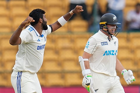 IND Vs NZ 1st Test: India's Jasprit Bumrah, left, celebrates the dismissal of New Zealand's captain Tom Latham