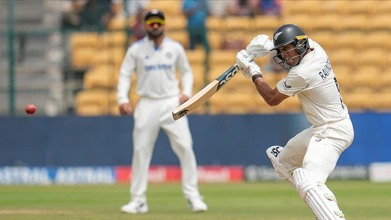 New Zealand's Rachin Ravindra plays a shot during day five of the first cricket test match between India and New Zealand at the M.Chinnaswamy Stadium, in Bengaluru. - AP Photo/Aijaz Rahi