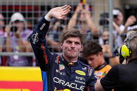 F1 US Grand Prix Auto Racing: Max Verstappen, of the Netherlands, waves after winning a sprint race