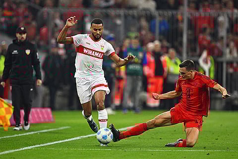Bundesliga 2024-25: Stuttgart's Josha Vagnoman, left, and Munich's Joao Palhinha battle for the ball