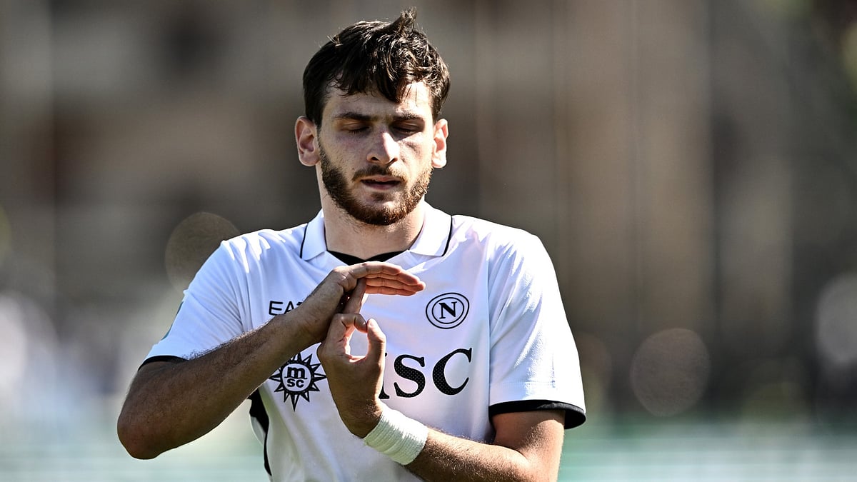 Khvicha Kvaratskhelia celebrates after scoring from the spot