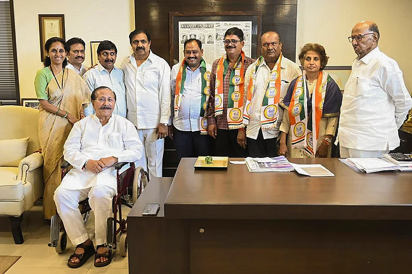 NCP (SP) chief Sharad Pawar, party leaders Supriya Sule and Jayant Patil