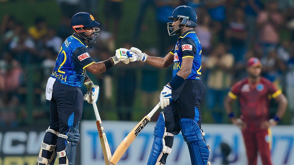 AP : Charith Asalanka and Nishan Madushka bat during the first ODI between Sri Lanka and West Indies in Pallekele.